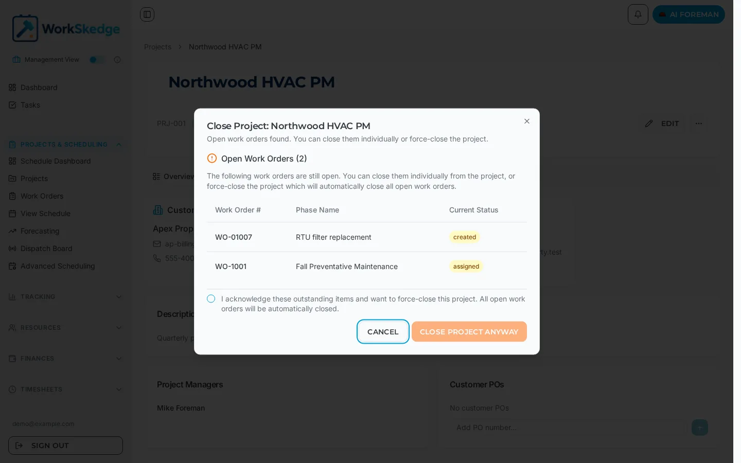 Close Project dialog in WorkSkedge listing two open work orders with statuses created and assigned, plus a force-close acknowledgement checkbox